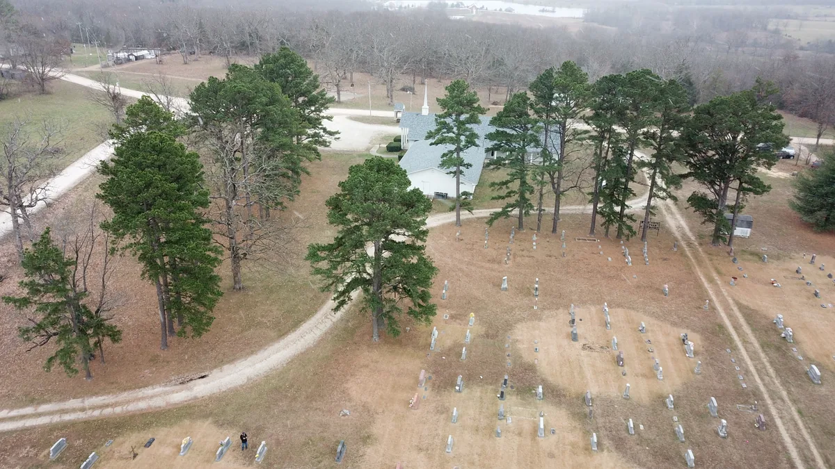 Aerial view of High Gate Baptist Cemetery with the church and surrounding trees
